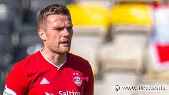 Michael Devlin: Fleetwood Town sign Scotland defender on short-term deal