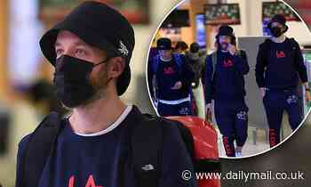 Hamish Blake and his friends wear matching tracksuits at Sydney Airport - Daily Mail