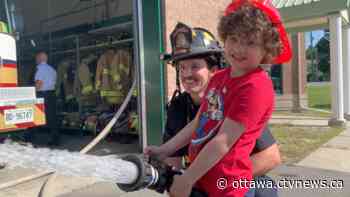 Ottawa firefighter provides child ASL truck tour at Manotick station - CTV News Ottawa
