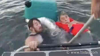 Dramatic video shows 2 men rescued while clinging to water cooler in Boston Harbor