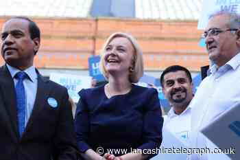 Former Tory councillor and Tiger Patel pictured with Liz Truss