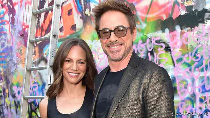 Kat Graham & Tom Hopper Pose Together at the Netflix Premiere of 'Love