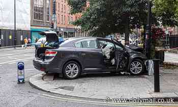 Car hits three people after mounting pavement in Dublin - Daily Mail