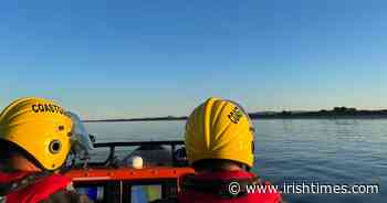 Tourists rescued from Dublin sand bank after rising tide traps them - The Irish Times