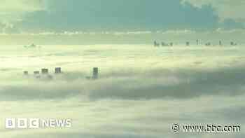 Sydney covered by a thick blanket of fog - BBC
