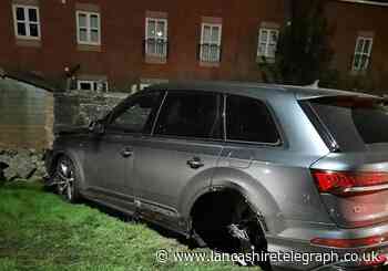 Audi driver ploughs into wall in Blackburn while being pursued by police