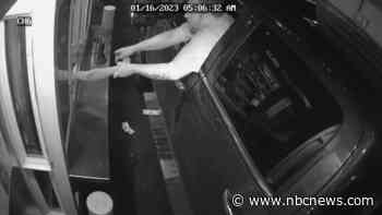 Video shows man trying to grab barista through drive-thru window in kidnapping attempt, police say