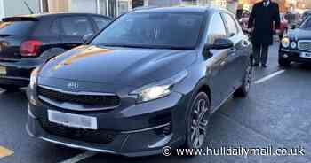 Anger as woman mounts pavement of Hull street to try to get around funeral procession