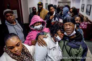 3 sentenced to life in slaying of Michigan security guard over face mask order