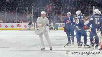 Camouflaged camera operator can't hide from Moncton hockey fans ... - CBC.ca