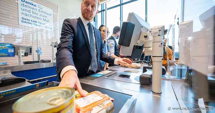 Supermarkt statt Staatskanzlei: Kretschmer an der Kasse