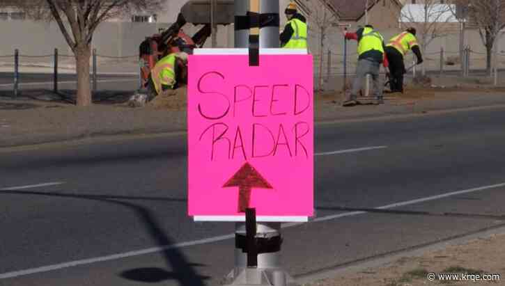 Handmade sign warns Albuquerque drivers of a speed camera