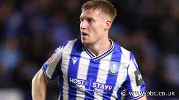 Cardiff City recall defender Mark McGuinness from Owls loan