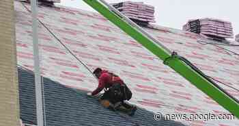 Workers putting new roof on landmark church in Saint Clair - Republican & Herald