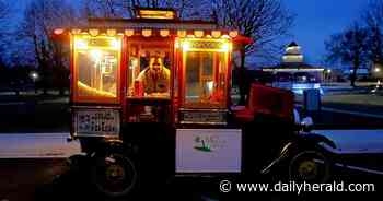 Volo man uses antique popcorn wagon to raise funds for children in need