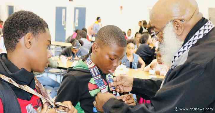 Turning tragedy into triumph, teaching youth to tie one tie at a time
