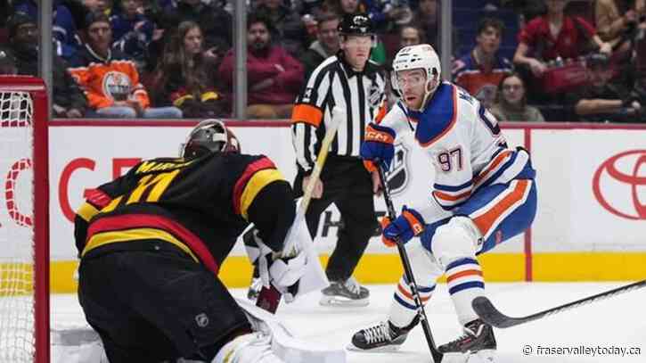Hyman puts up four points, Oilers down Canucks 4-2 to extend win streak