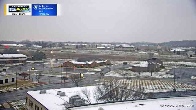 Scattered snow tonight then a midweek system