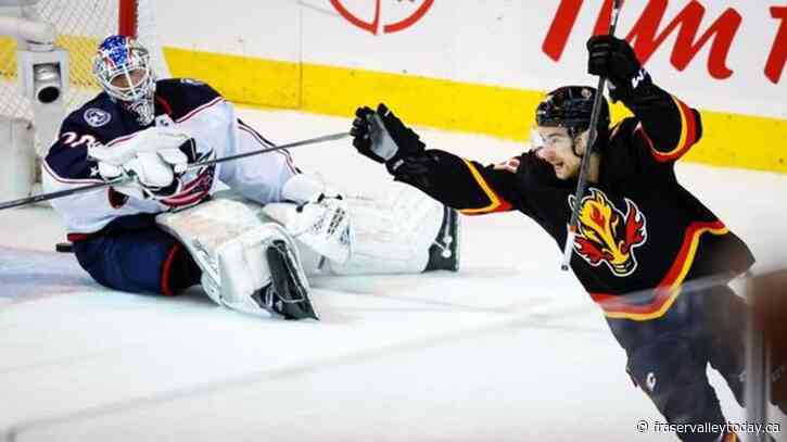 Flames edge Blue Jackets 4-3 in OT in Gaudreau’s return to Saddledome