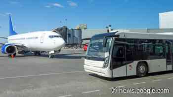 Why some airports use buses to transport passengers to planes - Traveller