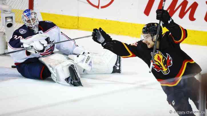 Flames edge Blue Jackets 4-3 in OT in Johnny Gaudreau's return to Saddledome