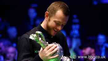 World Grand Prix: Mark Allen survives scare to beat Judd Trump in dramatic final