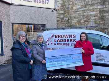 East Lancs ladder firm's £1,500 church donation