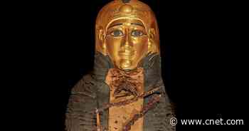 2,300-Year-Old 'Golden' Egyptian Mummy Unwrapped After Century in Museum Basement     - CNET