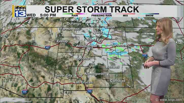 Cold and breezy, with more snow and rain east