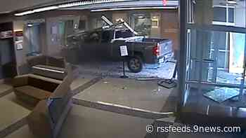 VIDEO: Man crashes truck into police station lobby