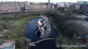Call to remove partially sunk ship in Dublin dock - RTE.ie
