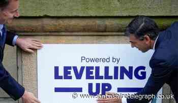 PM accused of 'flyposting' on Accrington building during visit