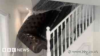 Bournemouth homeowner's fury over sofa wedged in stairs