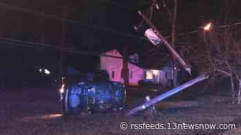 Car crashes into power pole in Suffolk