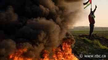 Israelis and Palestinians trade fire after deadly West Bank raid