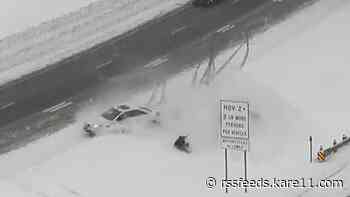 Car sends motorist flying after spinout, crash