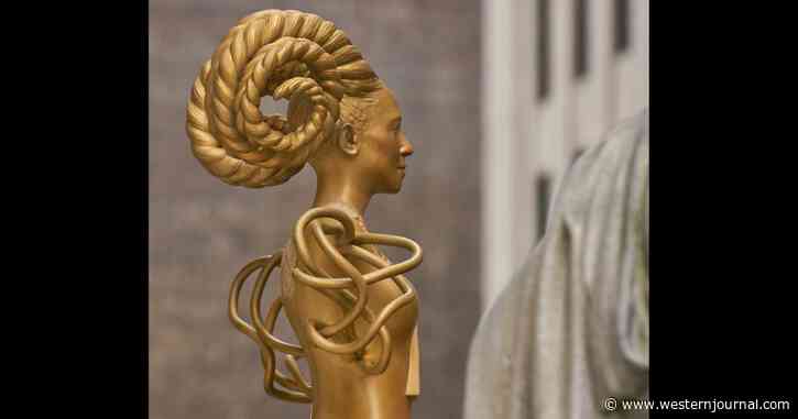 Demon-Like Sculpture Installed Atop Historic 1896 Courthouse