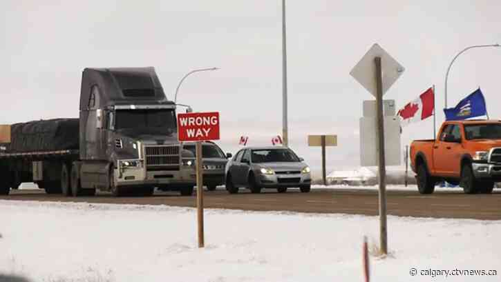 Convoy of Albertans make a 'Coutts Loop' in border town to mark 1-year anniversary of blockade