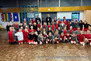 Blackburn Rovers’ Ryan Hedges and Harry Pickering visit school