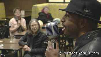 Grocery bagger by day, café crooner by night