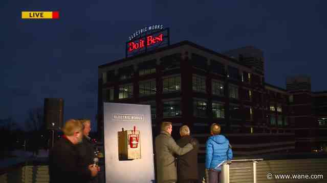 Electric Works Do it Best sign lights up Fort Wayne sky