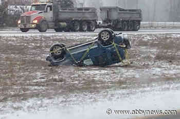Several flipped vehicles in ditches on Highway 1 through Abbotsford as snow hits region