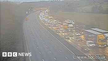 M1 Northamptonshire: Car crashes into barrier and with lorry