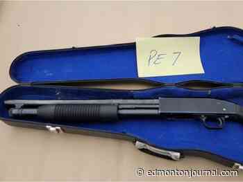 Edmonton man charged after loaded guns found in stolen truck