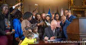 Gov. Walz signs bills making Juneteenth a state holiday and banning hair discrimination