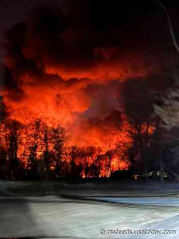 Train derailment in northeastern Ohio causes massive fire, evacuations