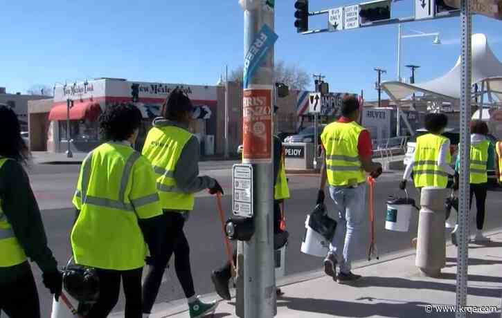 UNM Black Student Union cleans up bus stops for Transit Equity Day