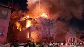 Crews battle duplex fire, winter elements in Minneapolis