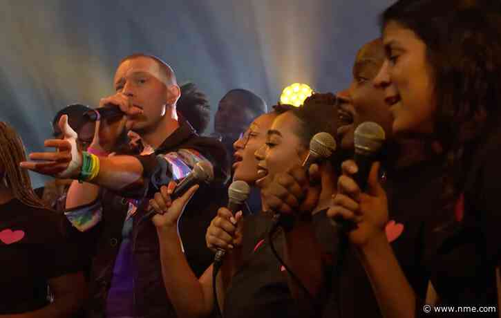 Watch Coldplay perform ‘Human Heart’, ‘The Astronaut’ and ‘Fix You’ with choir on ‘Saturday Night Live’