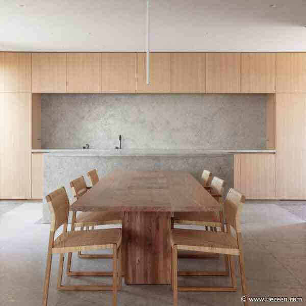 Wood and stone surfaces bring "rich texture" to Primrose Hill House interior